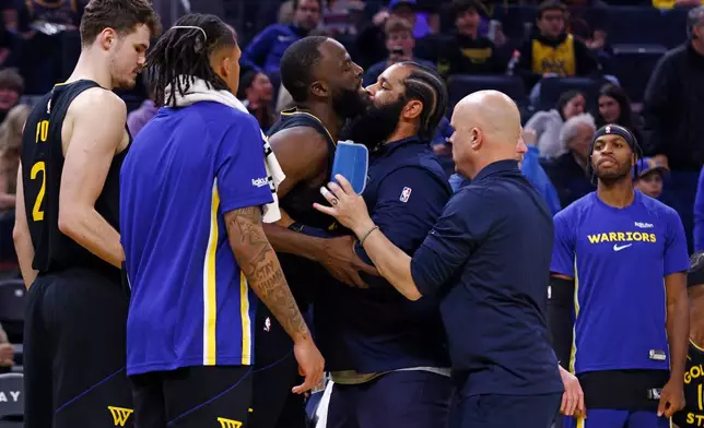 Golden State Warriors forward Draymond Green (23) is ejected in the second quarter during an NBA basketball game against the Phoenix Suns, in San Francisco, Saturday, Dec. 20, 2025. (Santiago Mejia/San Francisco Chronicle via AP)