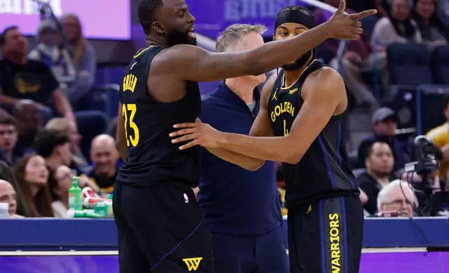 Golden State Warriors forward Draymond Green (23) is ejected in the first half during an NBA basketball game against the Phoenix Suns in San Francisco, Saturday, Dec. 20, 2025. (Santiago Mejia/San Francisco Chronicle via AP)