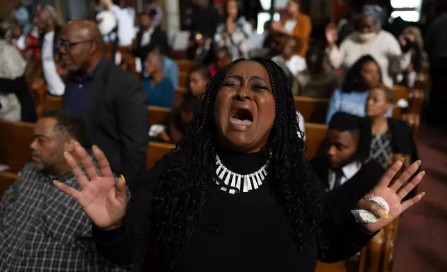 Darleen Hall worships during a service at New Mount Pilgrim Missionary Baptist Church, in Chicago, Sept. 7, 2025. (AP Photo/Carolyn Kaster, File)