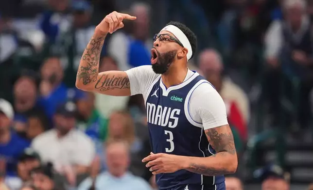 Dallas Mavericks' Anthony Davis (3) reacts to a foul call in the first half of an NBA basketball game against the Brooklyn Nets in Dallas, Friday, Dec. 12, 2025. (AP Photo/Tony Gutierrez)