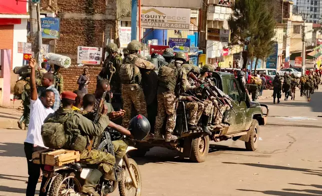 FILE - M23 rebels enter the centre of east Congo's second-largest city, Bukavu, and take control of the South Kivu province administrative office, Sunday, Feb. 16, 2025. (AP Photo/Janvier Barhahiga, File)