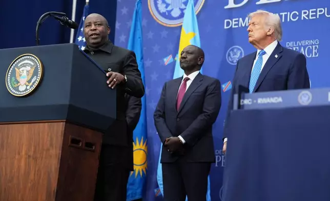 President of Burundi Évariste Ndayishimiye, speaks during ceremony with President Donald Trump at the Donald J. Trump Institute of Peace, Thursday, Dec. 4, 2025, in Washington. (AP Photo/Evan Vucci)