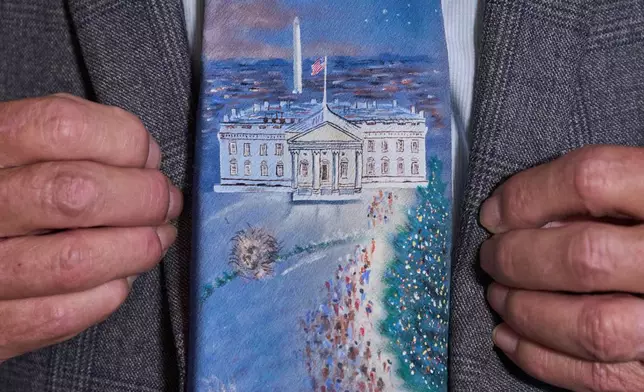 Former White House chief usher Gary Walters, author of "White House Memories," wears a White House themed tie, during an interview in Washington, Thursday, Dec. 4, 2025. (AP Photo/Jacquelyn Martin)