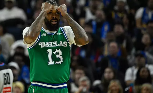 Dallas Mavericks forward Naji Marshall reacts against the Golden State Warriors during the first half of an NBA basketball game, Thursday, Dec. 25, 2025, in San Francisco. (AP Photo/Eakin Howard)