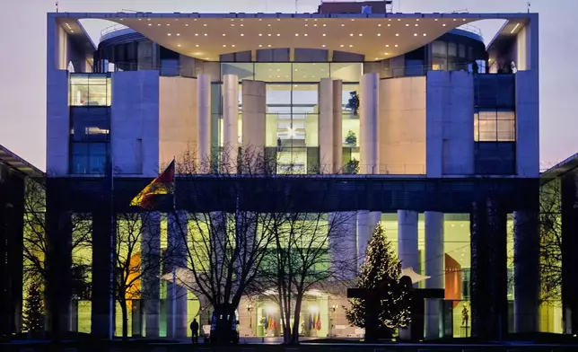 The chancellory is pictured during talks between representatives of the U.S. and Ukraine in Berlin, Germany, Sunday, Dec. 14, 2025. (AP Photo/Markus Schreiber)