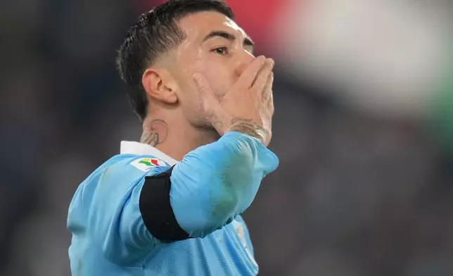 Lazio's Mattia Zaccagni reacts after scoring during the Italian Cup round of sixteen soccer match between Lazio and Milan, in Rome, Thursday, Dec. 4, 2025. (AP Photo/Andrew Medichini)