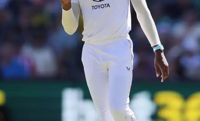England's Jofra Archer reacts during play on day one of the third Ashes cricket test between England and Australia at the Adelaide Oval in Adelaide, Australia, Wednesday, Dec. 17, 2025. (AP Photo/James Elsby)