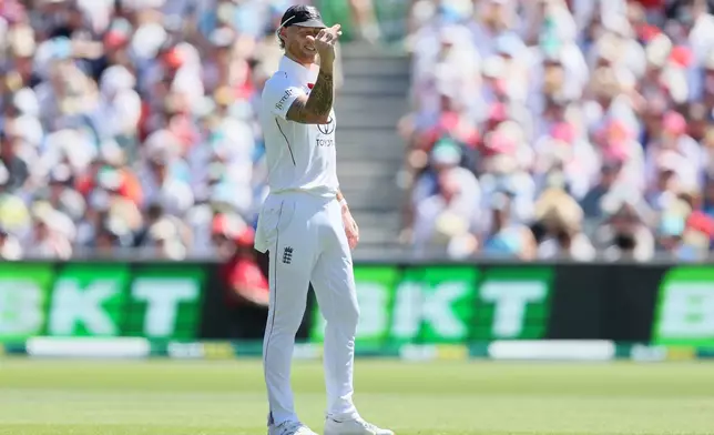 England's Ben Stokes directs his field during play on day one of the third Ashes cricket test between England and Australia at the Adelaide Oval in Adelaide, Australia, Wednesday, Dec. 17, 2025. (AP Photo/James Elsby)