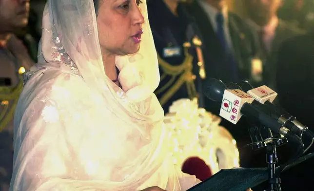 FILE - Khaleda Zia takes an oath of office as the prime minister in Dhaka, Bangladesh, Oct. 10, 2001. (AP Photo/Pavel Rahman, File)