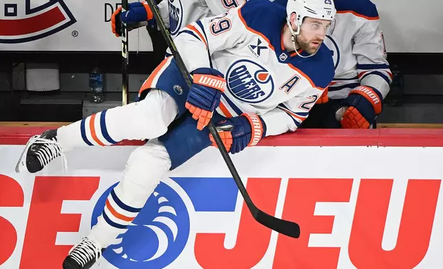 Edmonton Oilers' Leon Draisaitl (29) comes off the bench during the first period of an NHL hockey game, in Montreal, Sunday, Dec. 14, 2025. (Graham Hughes/The Canadian Press via AP)