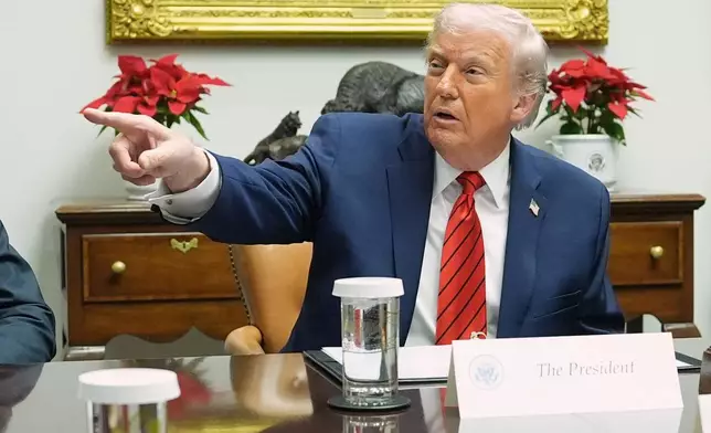 President Donald Trump speaks during a roundtable in the Roosevelt Room of the White House, Wednesday, Dec. 10, 2025, in Washington. (AP Photo/Evan Vucci)