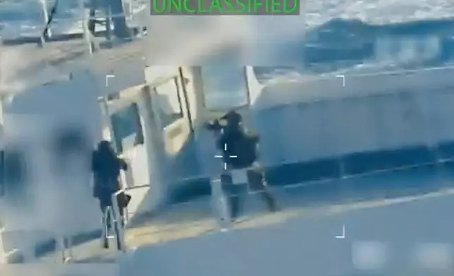 This image from video posted on Attorney General Pam Bondi's X account, and partially redacted by the source, shows an oil tanker being seized by U.S. forces off the coast of Venezuela, Wednesday, Dec. 10, 2025. (U.S. Attorney General's Office/X via AP)