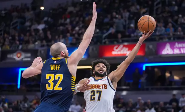 Denver Nuggets guard Jamal Murray (27) shoots over Indiana Pacers center Jay Huff (32) during the second half of an NBA basketball game in Indianapolis, Wednesday, Dec. 3, 2025. (AP Photo/Michael Conroy)