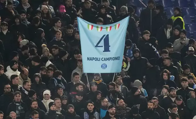 Napoli fans cheer prior to the start of the Serie A soccer match between Roma and Napoli, in Rome, Sunday, Nov. 30, 2025. (AP Photo/Gregorio Borgia)