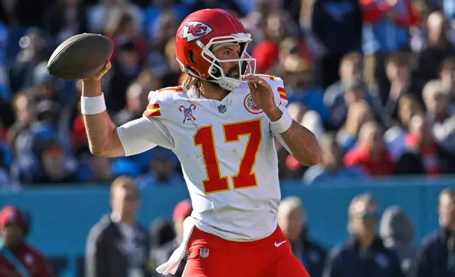 Kansas City Chiefs quarterback Gardner Minshew looks to pass during the first half of an NFL football game against the Tennessee Titans, Sunday, Dec. 21, 2025, in Nashville, Tenn. (AP Photo/John Amis)