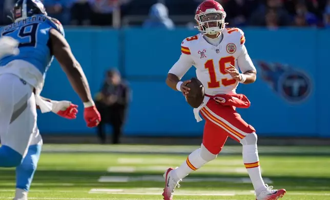Kansas City Chiefs quarterback Chris Oladokun looks to pass during the first half of an NFL football game against the Tennessee Titans, Sunday, Dec. 21, 2025, in Nashville, Tenn. (AP Photo/George Walker IV)