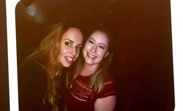 A snapshot of Alissa Kirby, right, a friend of murder victim Ana Walshe, at left, is shown on a monitor during Brian Walshe's murder trial, Wednesday, Dec. 10, 2025, in Dedham, Mass. (Mark Stockwell/The Boston Herald via AP, Pool)