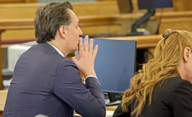 Defendant Brian Walshe, left, listens during his murder trial, Friday, Dec. 12, 2025, in Dedham, Mass. (Stuart Cahill/The Boston Herald via AP, Pool)