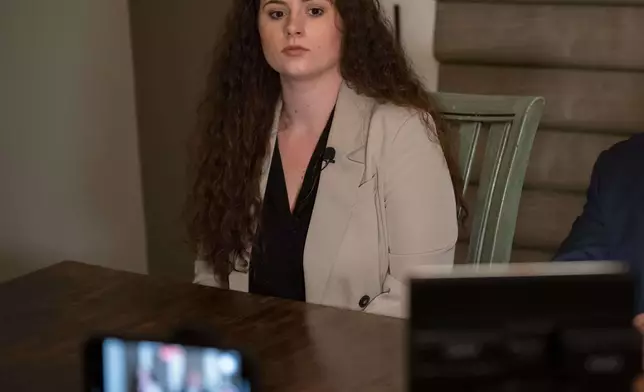 Baton Rouge, La., attorney Morgyn Young, who plans to file in federal court, talks about her client, Joseph "Tucker" Daniels, at Daniels' home in Thibodaux, La., Thursday, Nov. 13, 2025. (AP Photo/Matthew Hinton)