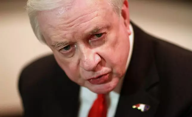FILE - Former North Carolina Gov. Jim Hunt speaks to the media at the Marriott hotel, in downtown Greensboro, N.C., Jan. 28, 2012, before The North Carolina Democratic Party's Sanford-Hunt-Frye Dinner, a fundraising event. (AP Photo/Ted Richardson, File)