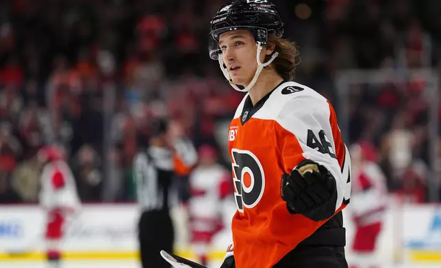 Philadelphia Flyers' Trevor Zegras celebrates after scoring during the first period of an NHL hockey game against the Carolina Hurricanes, Saturday, Dec. 13, 2025, in Philadelphia. (AP Photo/Derik Hamilton)