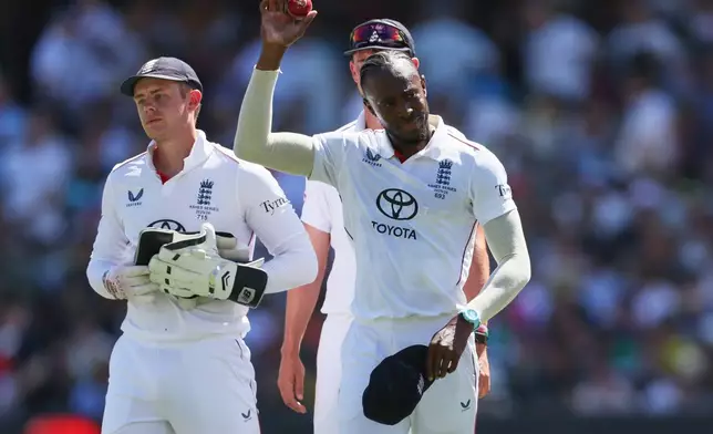 England's Jofra Archer reacts after taking five wickets during play on day two of the third Ashes cricket test between England and Australia in Adelaide, Australia, Thursday, Dec. 18, 2025. (AP Photo/James Elsby)