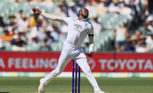 England's Jofra Archer bowls a delivery during play on day one of the third Ashes cricket test between England and Australia at the Adelaide Oval in Adelaide, Australia, Wednesday, Dec. 17, 2025. (AP Photo/James Elsby)