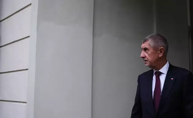Czech Republic's Prime Minister Andrej Babis leaves the Prague Castle after his government was appointed in Prague, Czech Republic, Monday, Dec. 15, 2025. (AP Photo/Petr David Josek)