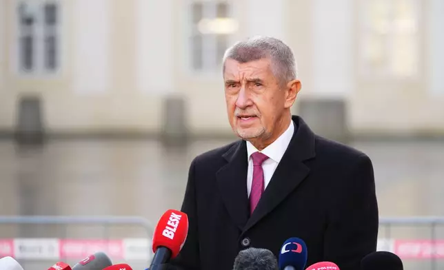 Leader of ANO political movement Andrej Babis addresses the media after being sworn in as the country's new prime minister at the Prague Castle in Prague, Czech Republic, Tuesday, Dec. 9, 2025. (AP Photo/Petr David Josek)