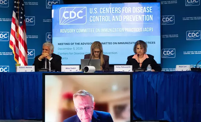 The CDC Advisory Committee on Immunization Practices meets in Atlanta on Friday, Dec. 5, 2025 to consider changes in hepatitis B vaccine recommendations for infants. (AP Photo/Ben Gray)