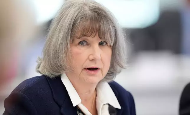 FILE - Committee member Vicky Pebsworth, speaks during a meeting of the Advisory Committee on Immunization Practices at the CDC, Sept. 18, 2025, in Chamblee, Ga. (AP Photo/Brynn Anderson, File)
