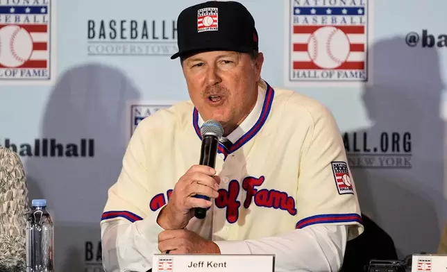 Jeff Kent answers questions after the announcement at a news conference that he was elected to baseball's Hall of Fame during the Major League baseball winter meetings, Monday, Dec. 8, 2025, in Orlando, Fla. (AP Photo/John Raoux)
