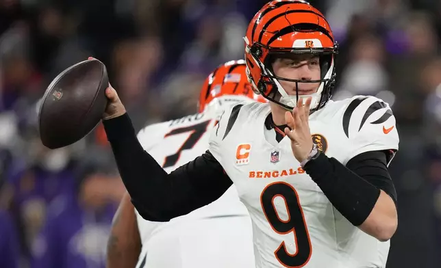 Cincinnati Bengals quarterback Joe Burrow throws a pass during the first half of an NFL football game against the Baltimore Ravens, Thursday, Nov. 27, 2025, in Baltimore. (AP Photo/Stephanie Scarbrough)