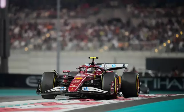 Ferrari driver Lewis Hamilton of Britain in action during the Abu Dhabi Formula One Grand Prix in Abu Dhabi, United Arab Emirates, Sunday, Dec. 7, 2025. (AP Photo/Darko Bandic)