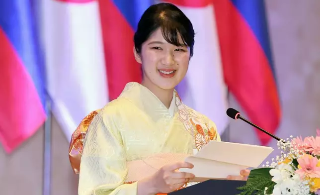 Japanese Princess Aiko speaks during a dinner hosted by Laos’ Vice President Pany Yathotou in Vientiane, Laos, on Nov. 18, 2025. (Japan Pool/Kyodo News via AP)