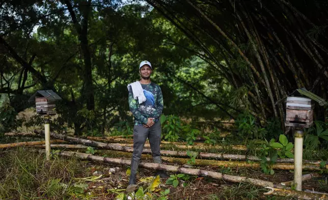 Ruben Pastrana poses for a photo on the outskirts of Puerto Asis, Colombia, Wednesday, Nov. 26, 2025. (AP Photo/Ivan Valencia)