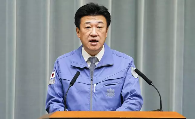 Japan's Chief Cabinet Secretary Minoru Kihara speaks during a news conference at the prime minister's office in Tokyo early Tuesday, Dec. 9, following a strong earthquake in northeastern Japan. (Kyodo News via AP)
