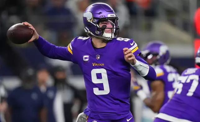 Minnesota Vikings quarterback J.J. McCarthy throws a pass during the first half of an NFL football game against the Dallas Cowboys Sunday, Dec. 14, 2025, in Arlington, Texas. (AP Photo/Julio Cortez)