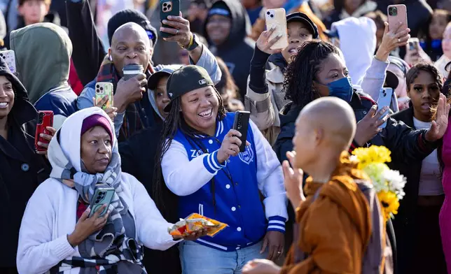 Buddhist monks on a "Walk for Peace" walk through Trilith in Fayetteville, Ga., on Monday, Dec. 29, 2025, from Texas to Washington, D.C. (Arvin Temkar/Atlanta Journal-Constitution via AP)