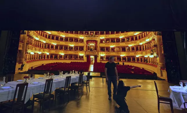 The stage is prepared ahead of the dressed rehearsal of the Lady Macbeth of Mtsensk District, by Dmitri Shostakovich, at La Scala Opera House in Milan, Italy, Thursday, Dec. 4, 2025. (AP Photo/Antonio Calanni)