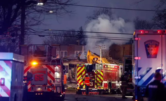 First responders work the scene of an explosion and fire at Bristol Health &amp; Rehab Center, Tuesday, Dec. 23, 2025, in Bristol, Pa. (Monica Herndon/The Philadelphia Inquirer via AP)