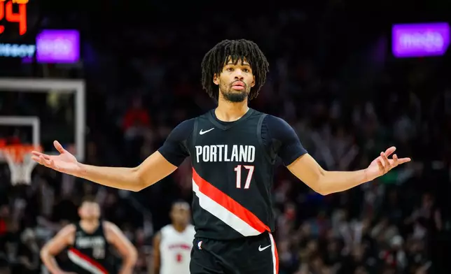 Portland Trail Blazers guard Shaedon Sharpe (17) reacts to a foul call during the second half of an NBA basketball game against the Detroit Pistons, Monday, Dec. 22, 2025, in Portland, Ore. (AP Photo/Molly J. Smith)