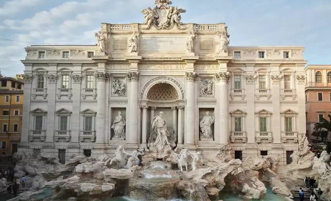 A view of Rome's Trevi Fountain, Friday, Dec. 19, 2025, as the city municipality announced that, starting on Feb. 1, it will impose a 2 euro fee for tourists to get close to the fountain. (AP Photo/Andrew Medichini)