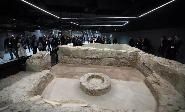 Ancient Roman finds backing to the 2nd century BC are on display in the 'Colosseo' new subway station, designed as a museum to showcase the archaeological finds uncovered during its construction, in Rome, Tuesday, Dec. 16, 2025. (AP Photo/Alessandra Tarantino)