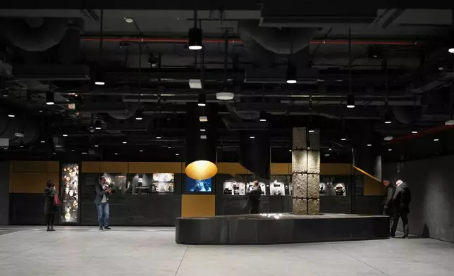 Ancient Roman finds backing to the 2nd century BC are on display in the 'Colosseo' new subway station, designed as a museum to showcase the archaeological finds uncovered during its construction, in Rome, Tuesday, Dec. 16, 2025. (AP Photo/Alessandra Tarantino)