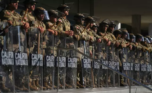 FILE - California National Guard are positioned at the Federal Building on Tuesday, June 10, 2025, in downtown Los Angeles. (AP Photo/Eric Thayer, File)