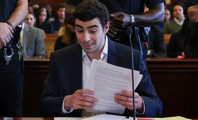 Luigi Mangione appears in Manhattan Criminal Court for an evidence hearing, Thursday , Dec. 18, 2025, in New York. (Shannon Stapleton/Pool Photo via AP)