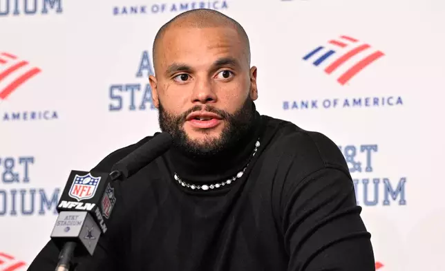 Dallas Cowboys quarterback Dak Prescott speaks during a news conference after an NFL football game against the Minnesota Vikings Sunday, Dec. 14, 2025, in Arlington, Texas. (AP Photo/Jerome Miron)