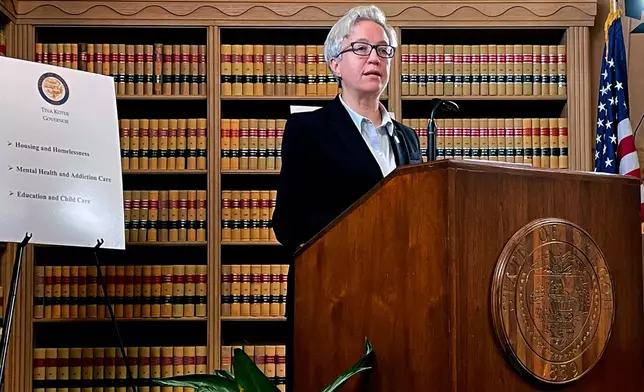 FILE - Newly inaugurated Oregon Gov. Tina Kotek unveils her first budget proposal as governor at the State Library of Oregon in Salem on Jan. 31, 2023. (AP Photo/Claire Rush, File)