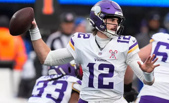 Minnesota Vikings quarterback Max Brosmer (12) passes against the New York Giants during the third quarter of an NFL football game, Sunday, Dec. 21, 2025, in East Rutherford, N.J. (AP Photo/Frank Franklin II)